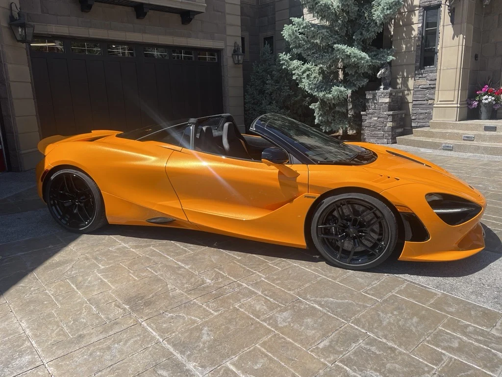 McLaren 750S Spider in profile, showing the dihedral door and side intake
