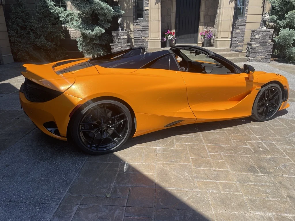 McLaren 750S Spider from the rear, showing the active rear spoiler